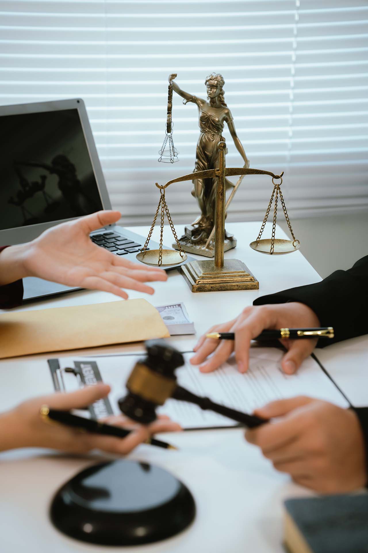 Professional lawyers consult with clients in the office on legal Common Examples of Government Liability Cases